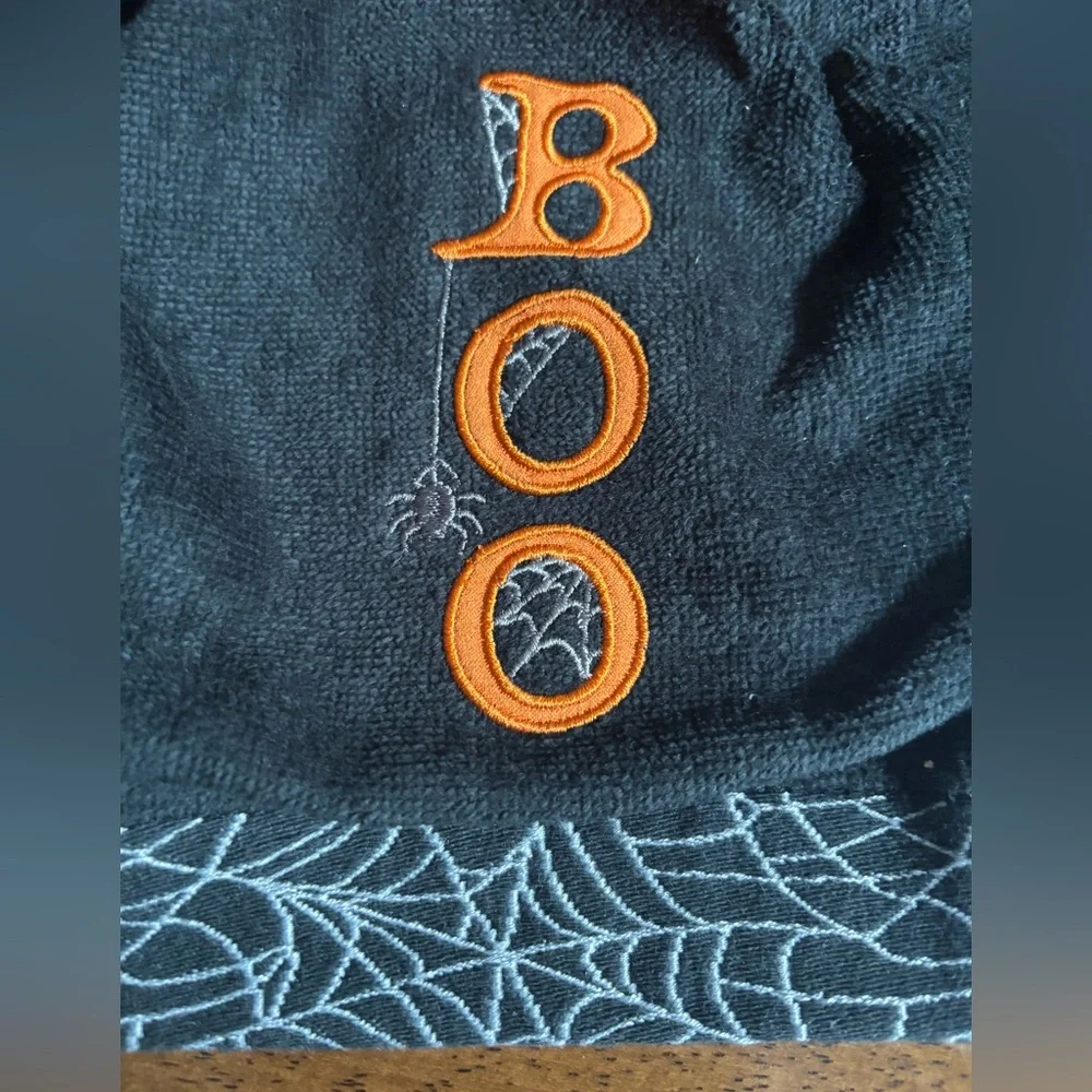 Hand crocheted Halloween black towel with “Boo” embroidery